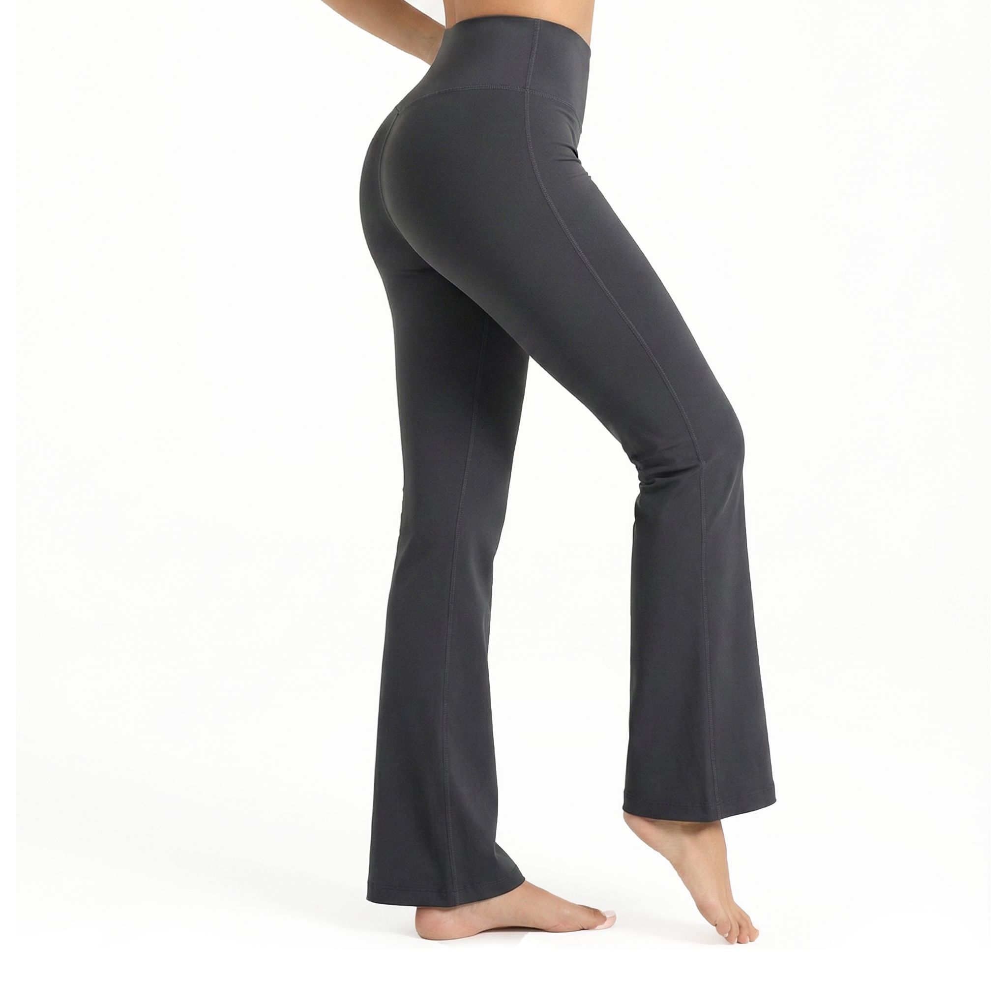 Dark grey bootcut leggings worn by a person on a white background