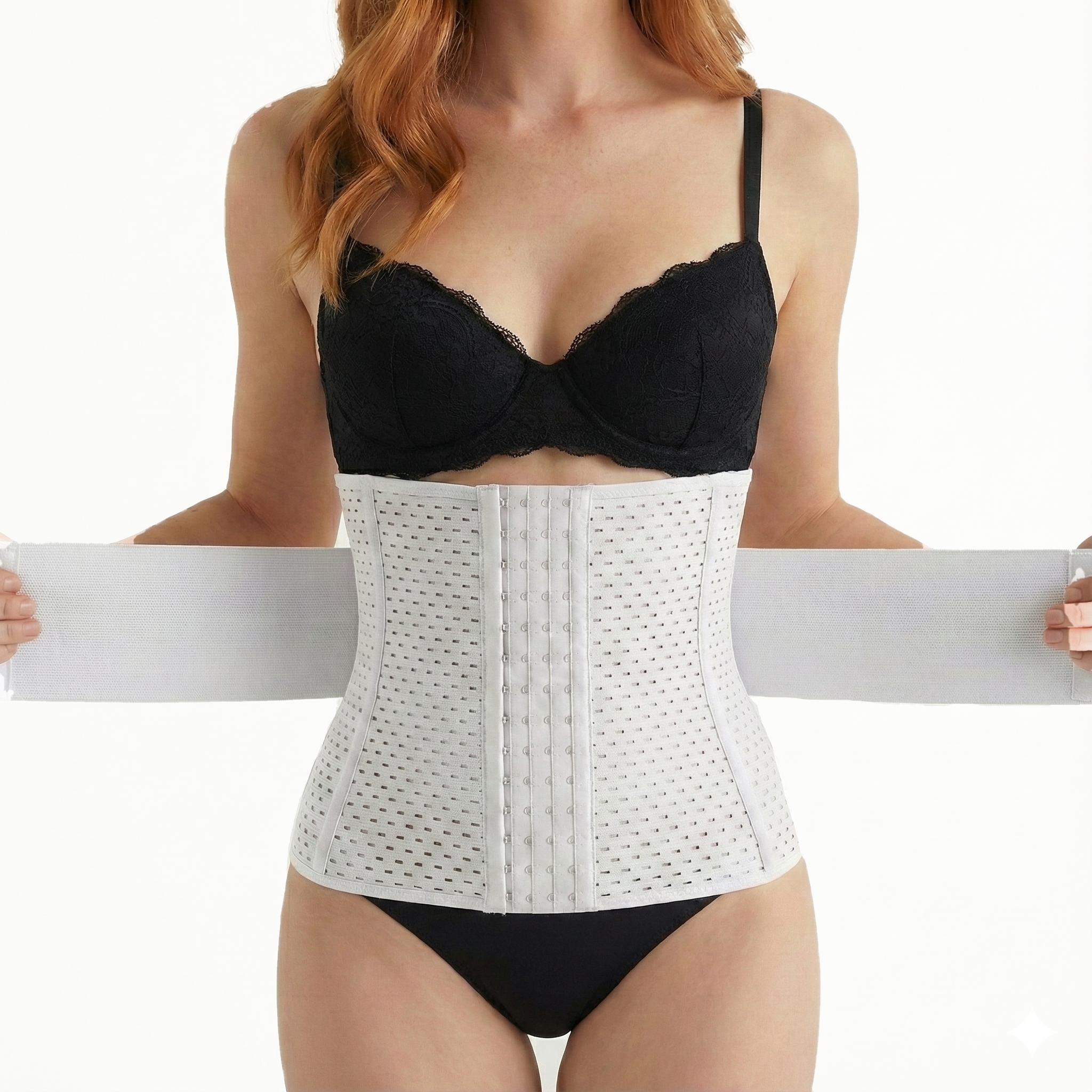 Person wearing a black bra and white waist trainer on a white background