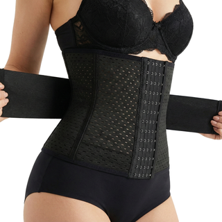 Black waist trainer worn by a person on a white background