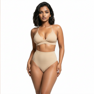 Woman wearing a beige high waist shaping thong on a white background, front view