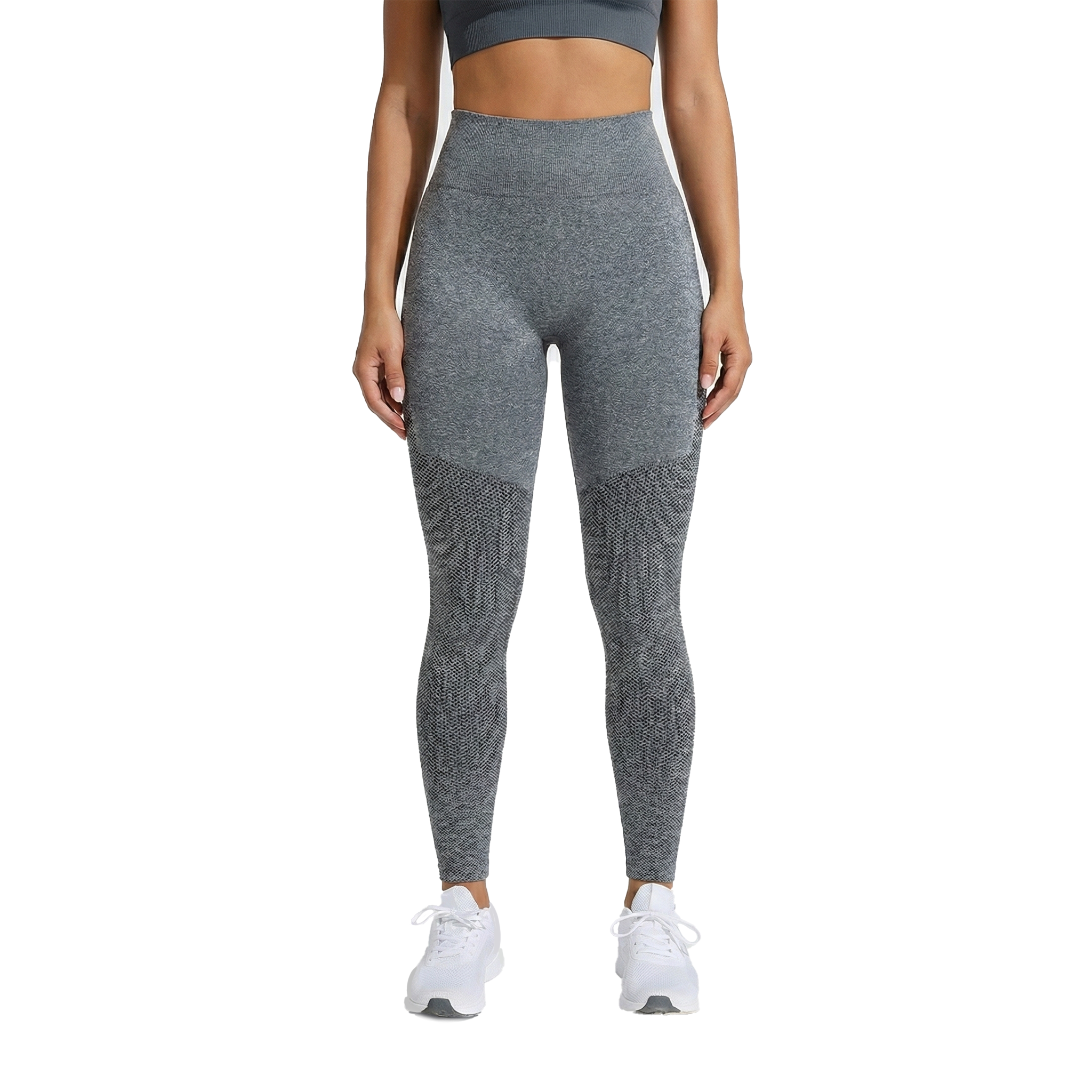 Person wearing gray leggings on a white background, front view