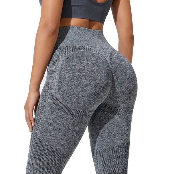 Gray athletic leggings worn by a person on a white background, back view