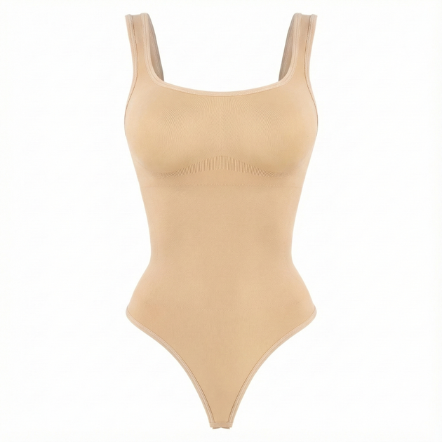 Beige thong bodysuit on a white background